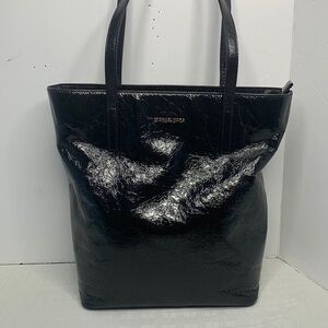 Michael Kors a black Vertical Tote.